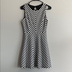 Black and white open back dress